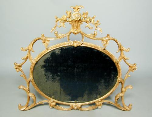 George III period carved giltwood oval mirror, circa 1770