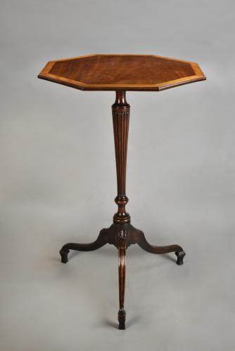 Sheraton mahogany octagonal lamp table on fluted and carved base, c.1790