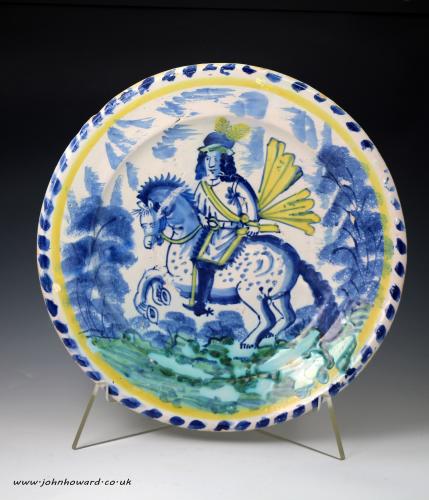 English pottery delftware blue dash charger of figure on Horseback circa 1690-1710