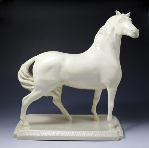 Creamware pottery figure of a standing horse made at Seniors Leeds Pottery