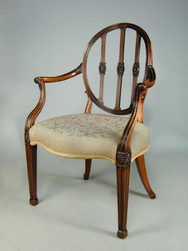Adam period oval backed carved mahogany armchair, circa 1780