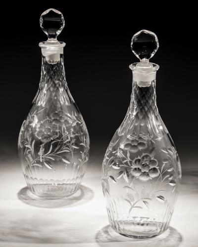 A Pair of Scale and Flute Cut Club Shaped Georgian Decanters with Engraved Flowers