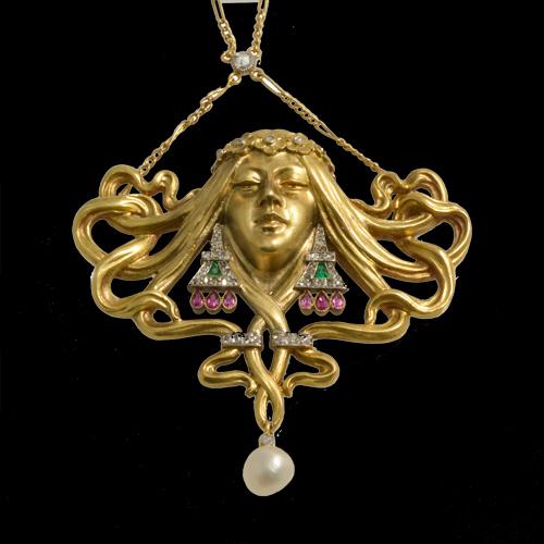 Art Nouveau pendant /brooch by Plisson and Hartz French 18ct with diamond rubies emerald and pearls circa 1900