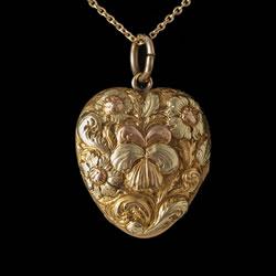 Three colour gold Victorian embossed 18ct locket Circa 1880