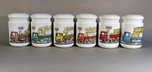 Set of Piero Fornasetti Opaque White Glass Food Jars and Covers made for Fiat, Six Jars with Lorry or Truck motif, Circa 1960