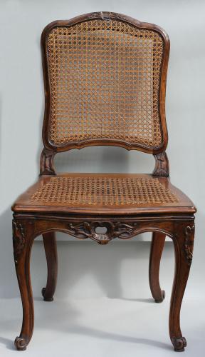 Set of eight Louis XV provincial walnut dining chairs