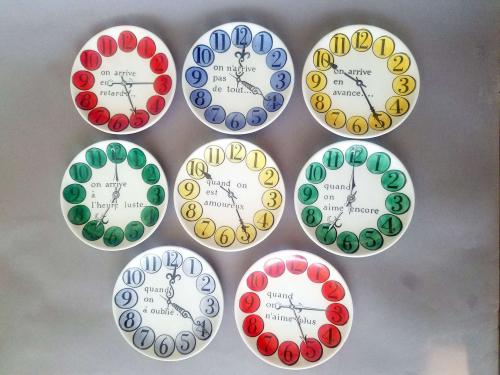 Piero Fornasetti Set of Eight "Quand on Arrive" Clock Coaste When one arrives, Early 1960s