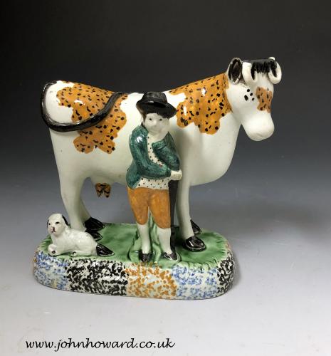 Yorkshire Pottery Prattware Cow with Herdsman and his dog early 19th century England