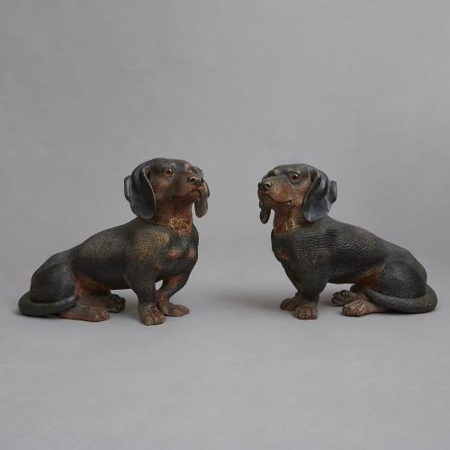 Pair of near life size Cold Painted Terracotta Dachshunds