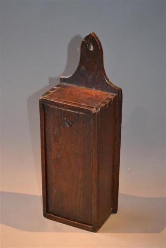 A simple George III oak candlebox
