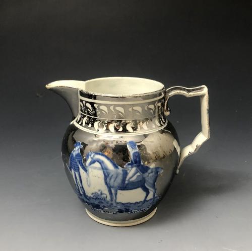 Silver lustre pottery pitcher with blue transfer print titled Horse and Jockey early 19th century