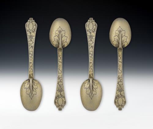 An extremely rare set of four William & Mary silver gilt scratch engraved Trefid Teaspoons made in London circa 1690, maker's mark of AH, with a crown above and cinquefoil below