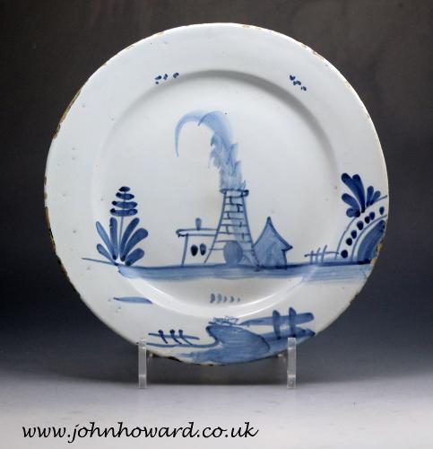 English delftware pottery blue and white plate with image of a kiln mid 18th century