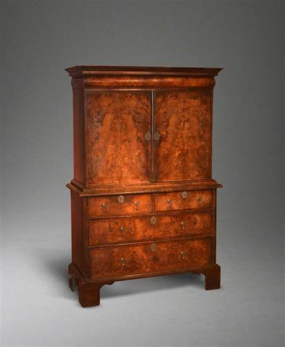 A small Queen Anne burr walnut cabinet on chest