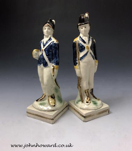 Pair of Prattware pottery Loyal Volunteer military figures late 18th century