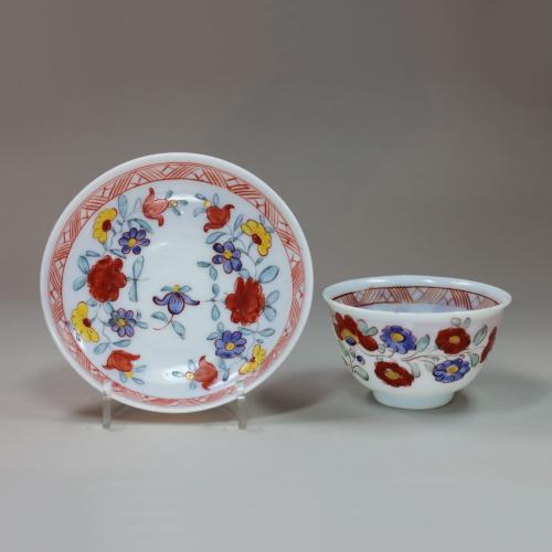 German milk glass teabowl and saucer, 18th century