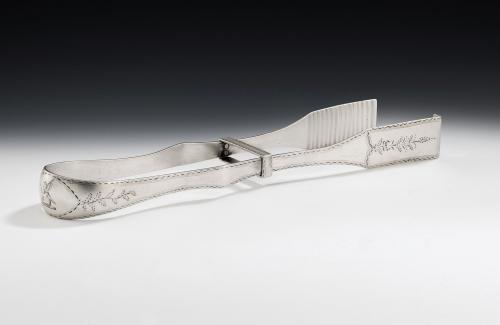 A very rare & unusual pair of Serving Tongs made in Dublin in 1793 by Benjamin Tait