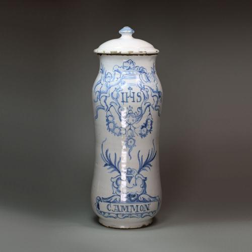 Spanish blue and white faience albarello and cover, dated 1773