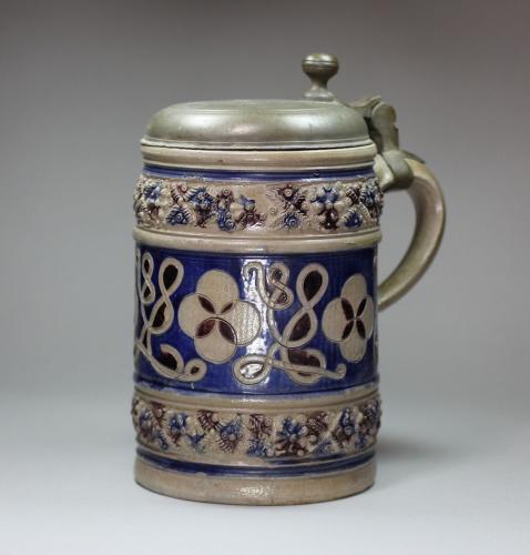 German Westerwald stoneware tankard with pewter cover, 18th century
