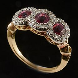Edwardian triple cluster ruby and diamond ring