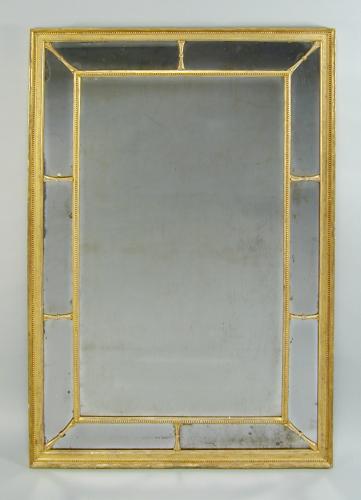 A fine Adam period border glass mirror retaining its original plates and gilding, c.1780