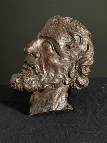 Carved oak head, circa 1700