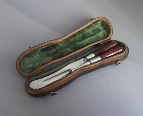 An extremely rare George II cased Knife & Fork.  Made, most probably, in London circa 1730-40