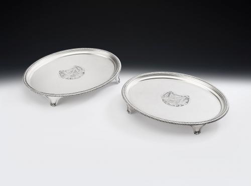 An exceptionally fine pair of George III Salvers made in London in 1810 by William Frisbee