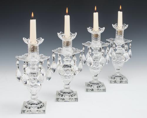 A set of four cut glass slipover candlesticks in 18th century style