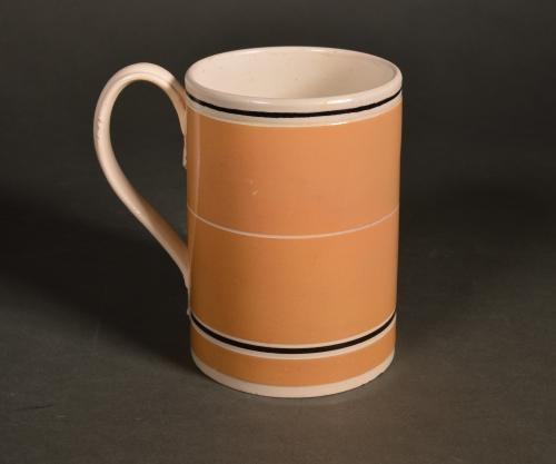 Mocha Pottery Mug with Ochre Slip Ground, Circa 1790-1810
