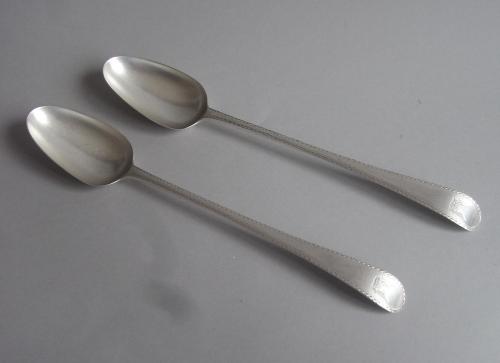 A very fine pair of George III Stuffing/Serving Spoons made in London in 1778, maker's mark of J.S.
