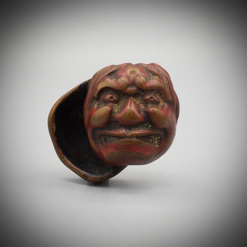 Worn Lacquered Wood Netsuke of Two Masks