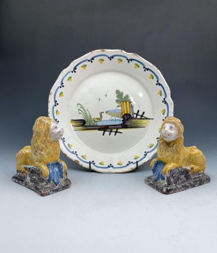 Continental faience pottery group a plate with two lions c1750-1815 period