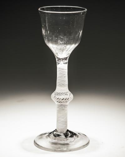 An opaque twist wine glass with ribbed bowl
