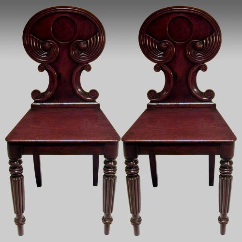 pair of Regency mahogany hall chairs