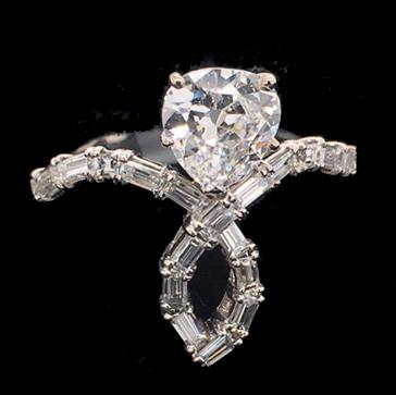 Pear shaped and baguette diamond ring, circa 1950