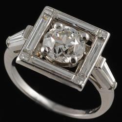 Platinum Art Deco baguette and centre diamond ring