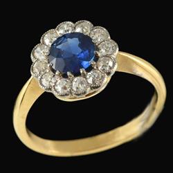 Platinum gold sapphire and diamond cluster ring