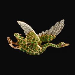 Demantoid and diamond flying bird brooch, Edwardian