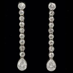 Platinum set fine drop earrings, circa 1920