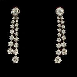 Long drop diamond earrings, circa 1900