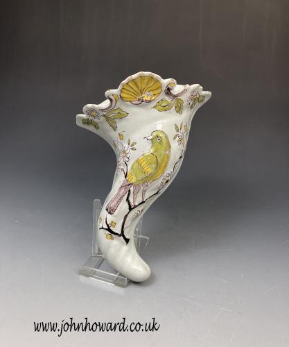 English delftware wall pocket with a bird and floral decoration mid 18th century Liverpool