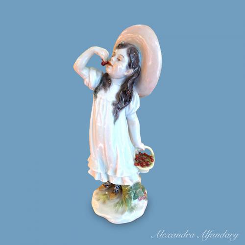 A Collectable Art Nouveau Meissen Figure of a Cherry Eating Girl by Paul Helmig, circa 1907
