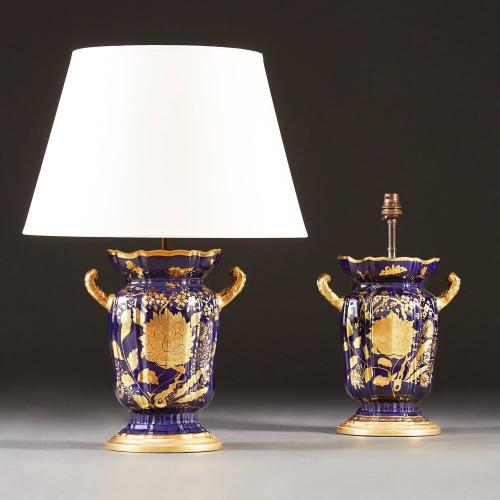 A Pair of Edwardian Blue and Gilt Lamps