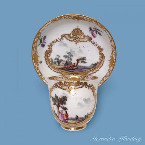 A Rare 18th Century Meissen Porcelain Cup And Saucer With Painted Scenes, circa 1760