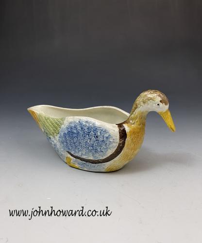 Prattware pottery sauceboat in the form of a duck English circa 1810