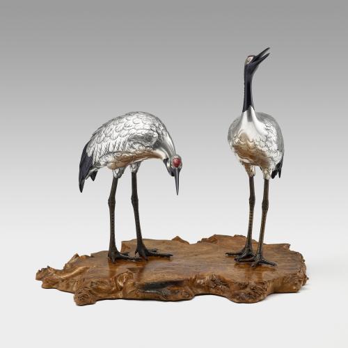 Japanese silvered bronze pair of Manchurian cranes signed Hidenao,  Meiji Period