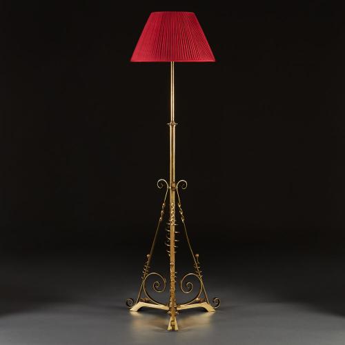 An Arts and Crafts Brass Standard Lamp