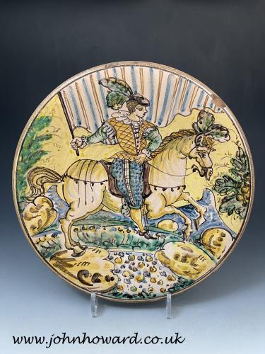Montelupo Charger mid 17th century with equestrian figure holding a banner.