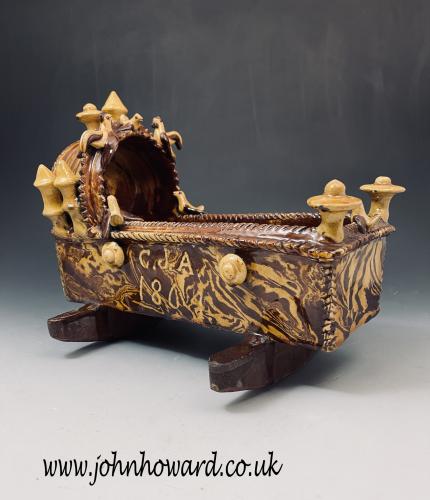 Large slipware earthenware cradle Halifax Yorkshire and initialed CJA dated 1804